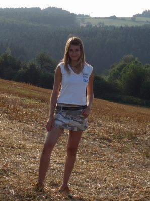 A woman caresses herself spreading her legs apart on the camera. Part 2. Thumbnail 16