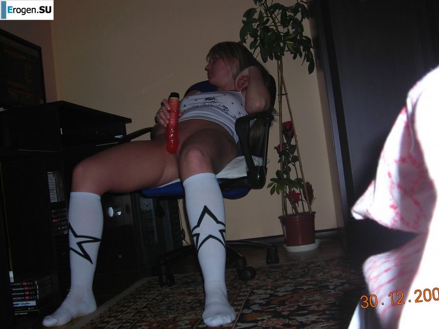 Appetizing blonde masturbates in front of the computer. Slide 27
