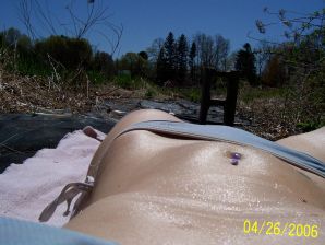 Passionate minx dances striptease in nature with a snake. Thumbnail 28