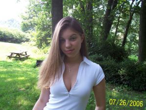 Passionate minx dances striptease in nature with a snake. Thumbnail 3