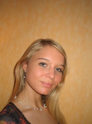 A young blonde in stockings spreads her legs on the sofa. Thumbnail 18