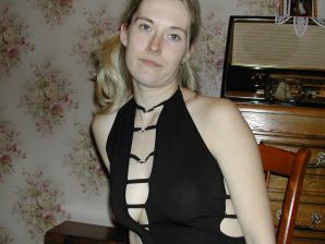 A blonde with a thin waist poses in front of her husband in the car and at home. Part 3. Thumbnail 10
