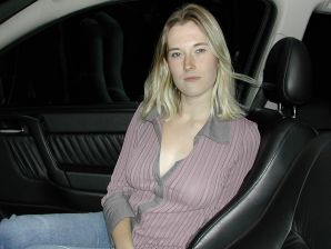 A blonde with a thin waist poses in front of her husband in the car and at home. Part 3. Thumbnail 2
