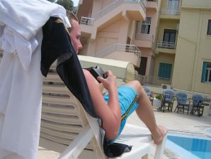 A girl has fun with a guy on vacation - shows her ass and chest. Thumbnail 24