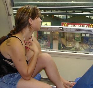 A lush woman bares her tits on the street and takes off her panties. Thumbnail 9