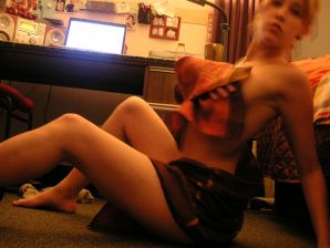 A sexy girl lights up at a party in fishnet stockings. Thumbnail 22