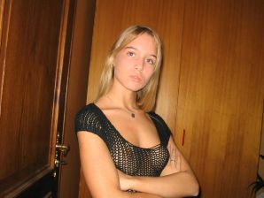 A young blonde in stockings spreads her legs on the couch. Part 2. Thumbnail 2