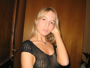 A young blonde in stockings spreads her legs on the couch. Part 2. Thumbnail 3