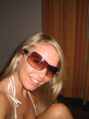 A young blonde in stockings spreads her legs on the couch. Part 2. Thumbnail 35