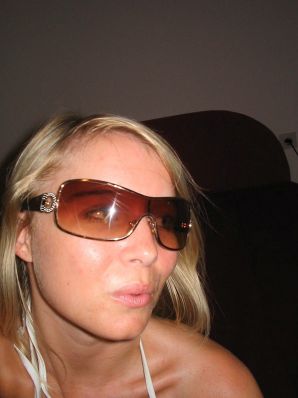 A young blonde in stockings spreads her legs on the couch. Part 2. Thumbnail 36