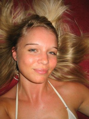 A young blonde in stockings spreads her legs on the couch. Part 2. Thumbnail 37