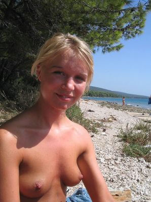 A young blonde in stockings spreads her legs on the couch. Part 2. Thumbnail 40