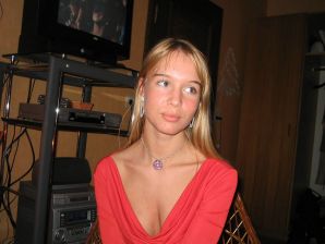 A young blonde in stockings spreads her legs on the couch. Part 2. Thumbnail 5