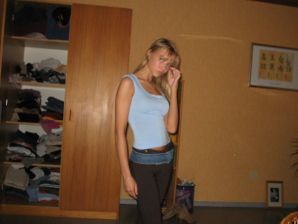 A young blonde in stockings spreads her legs on the couch. Part 3. Thumbnail 1