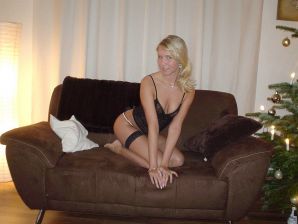A young blonde in stockings spreads her legs on the couch. Part 3. Thumbnail 19