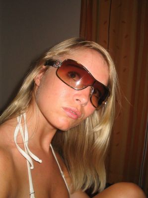 A young blonde in stockings spreads her legs on the couch. Part 3. Thumbnail 46