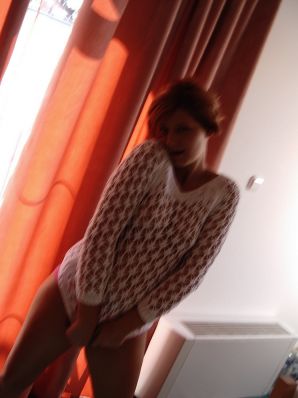 Naughty red-haired girl in pink panties fingering nipples. Thumbnail 21