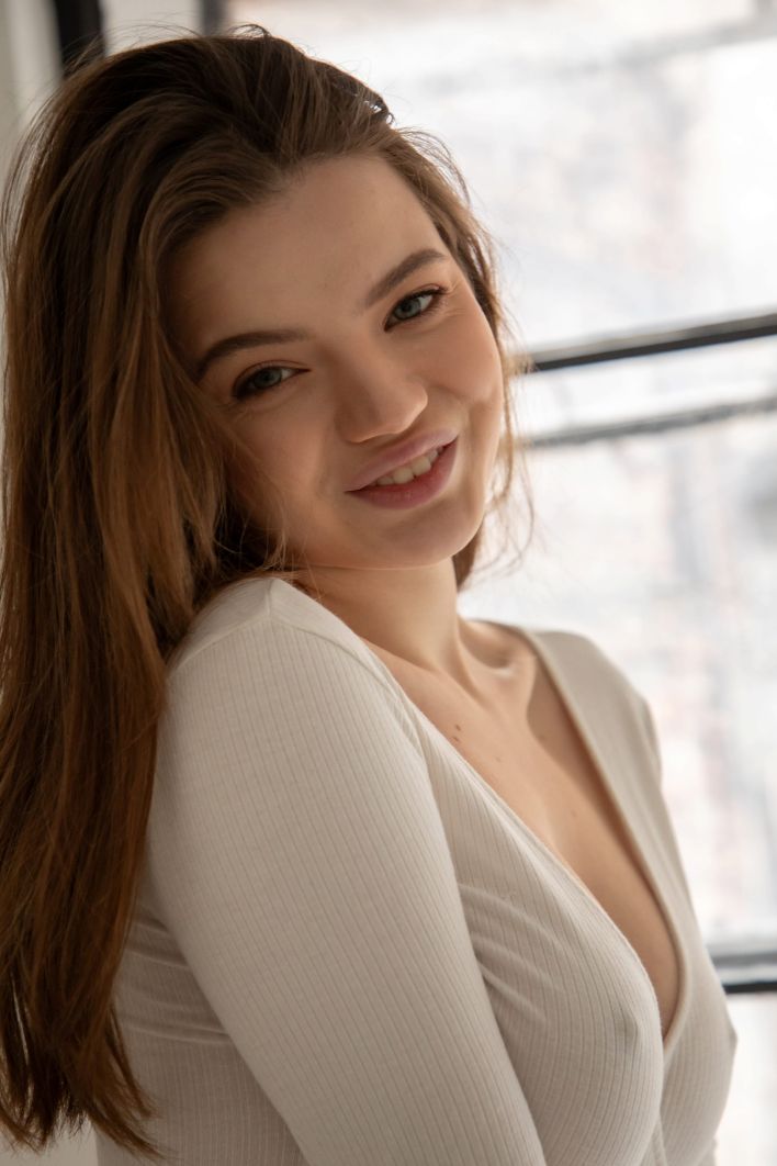 Toree in White Bodysuit. Thumbnail 2